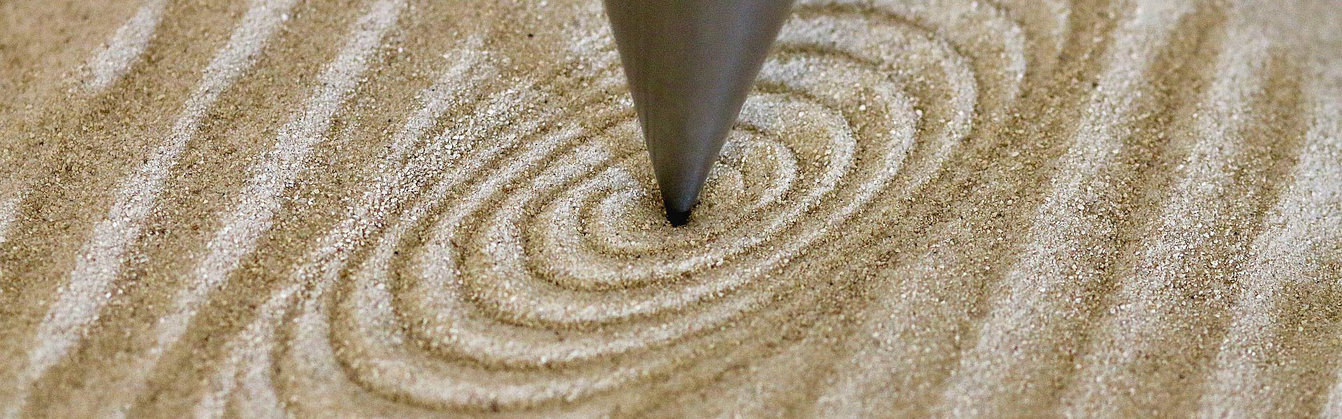 Spiralspuren im Sand